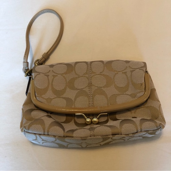 Coach Handbags - COACH BAG - Authentic Coach Golden Clutch wristlet. Canvas w/Kiss-Lock latch.
